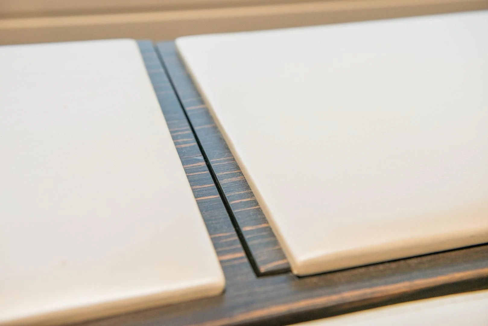 a notebook with a pen on it aboard BLUE BAY Yacht for Sale