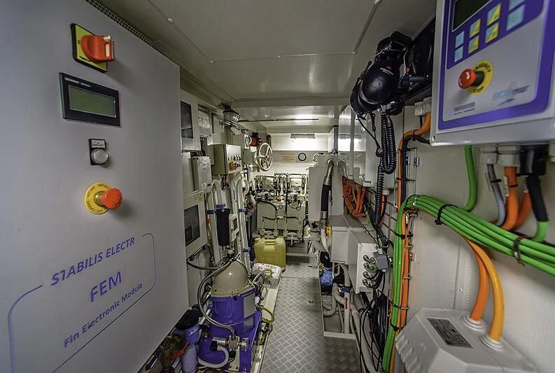 a room with several machines aboard BLUE BAY Yacht for Sale