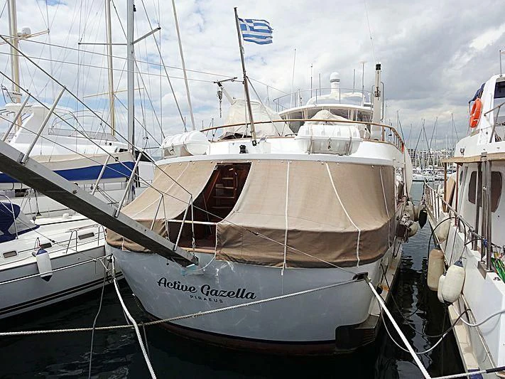 a boat is parked in a harbor aboard ACTIVE GAZELLA Yacht for Sale