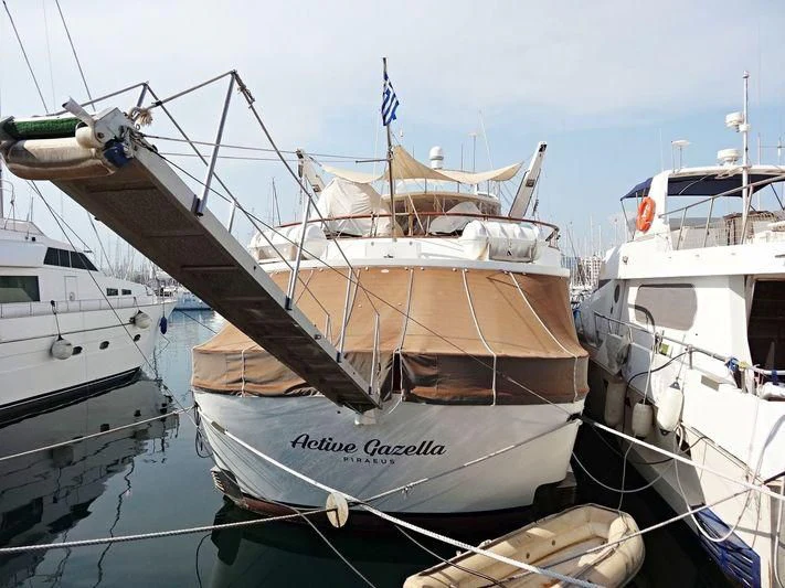 a boat docked at a pier aboard ACTIVE GAZELLA Yacht for Sale