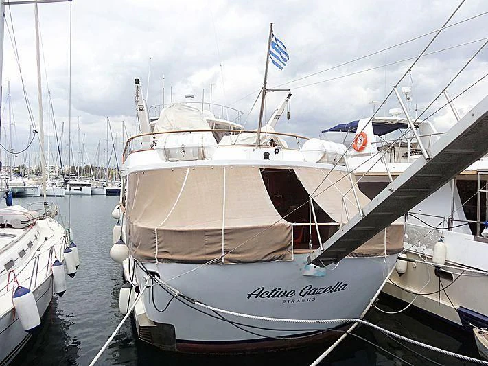a boat docked at a pier aboard ACTIVE GAZELLA Yacht for Sale