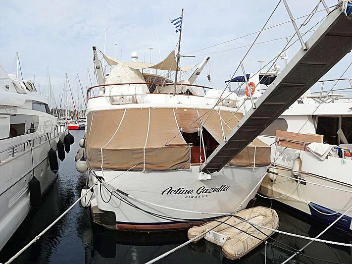 a boat docked at a pier aboard ACTIVE GAZELLA Yacht for Sale