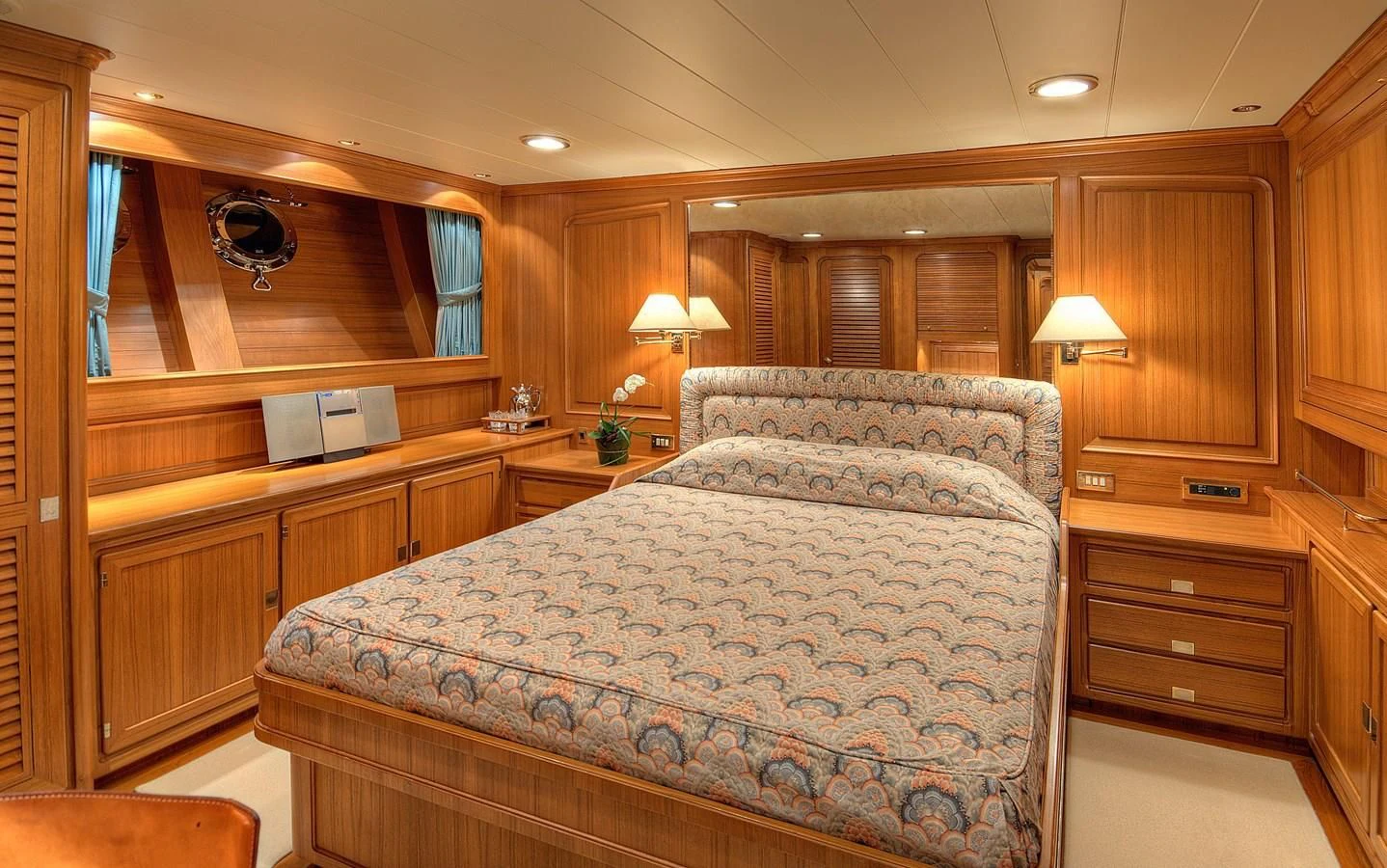 a bedroom with a large bed aboard MORNING GLORY Yacht for Sale