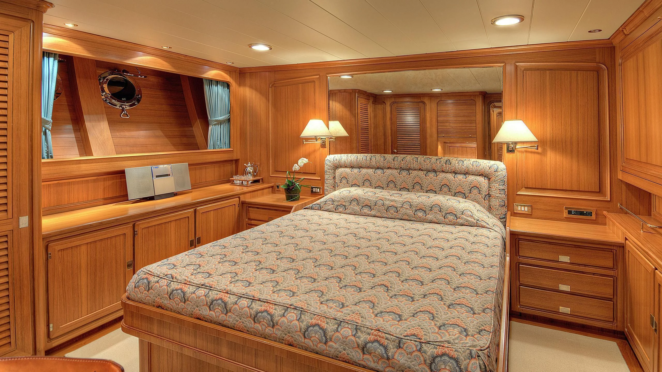 a bedroom with a large bed aboard MORNING GLORY Yacht for Sale