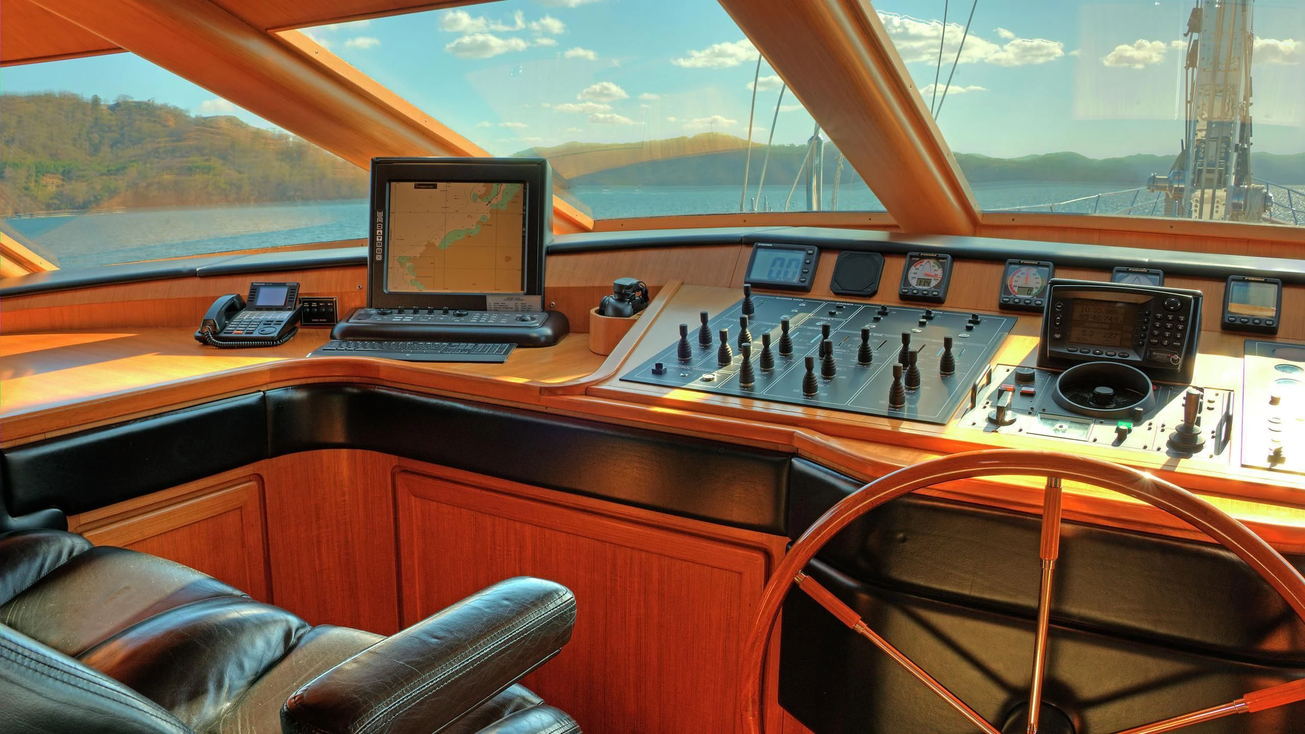 a control panel in a cockpit aboard MORNING GLORY Yacht for Sale