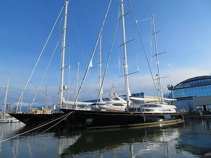 a boat docked at a pier aboard MORNING GLORY Yacht for Sale