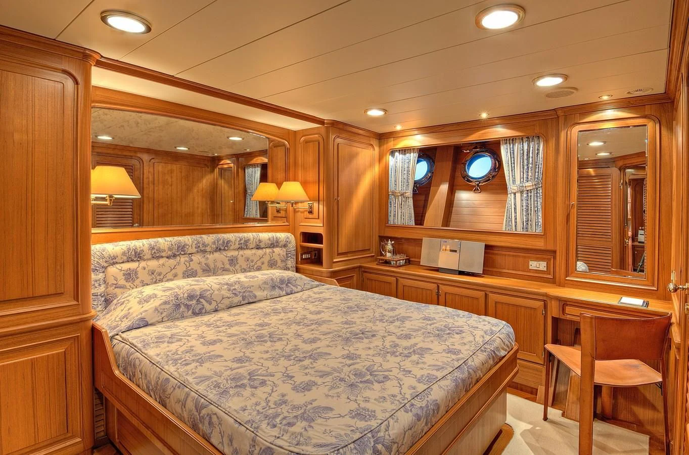a large bedroom with a large bed aboard MORNING GLORY Yacht for Sale