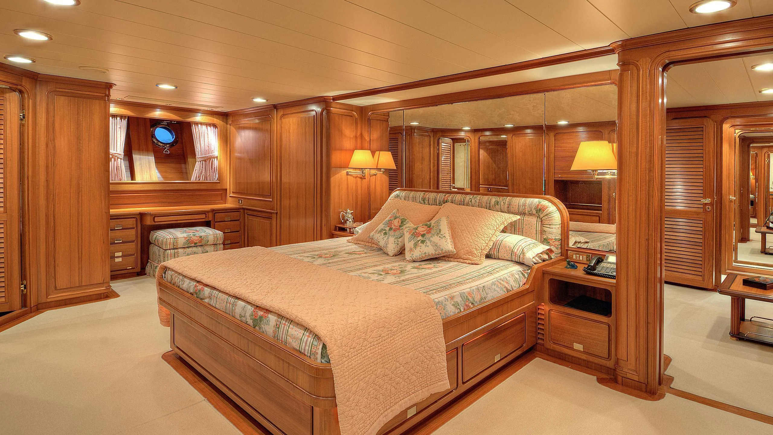 a large bedroom with a large bed aboard MORNING GLORY Yacht for Sale