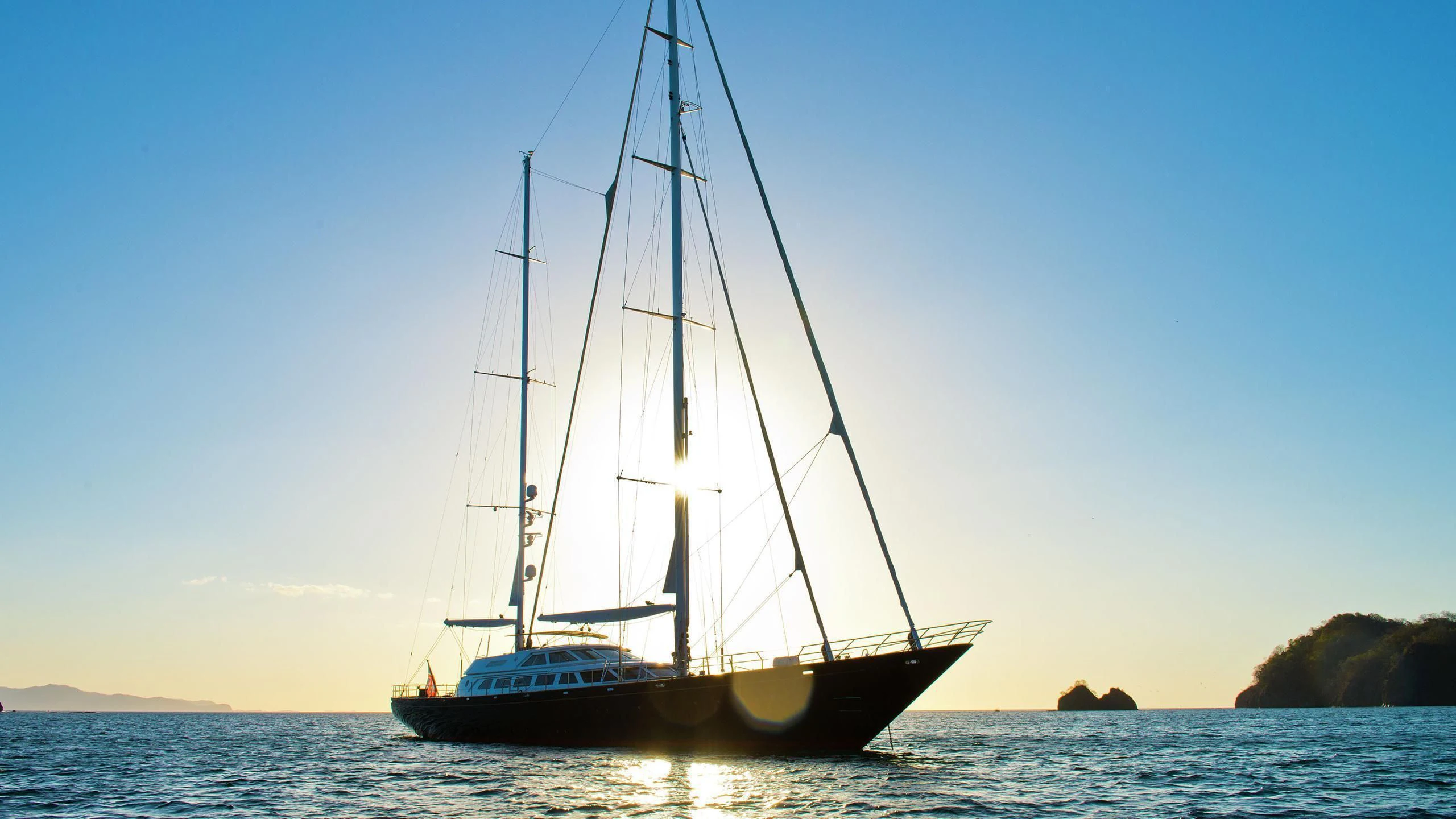 a sailboat on the water aboard MORNING GLORY Yacht for Sale