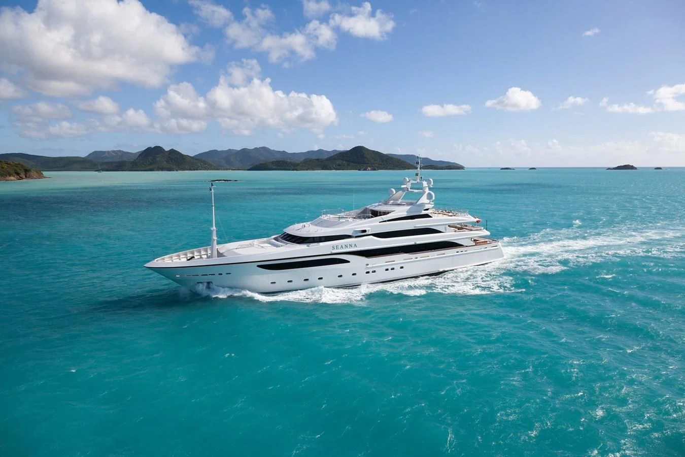 a white boat in the water aboard SEANNA Yacht for Sale