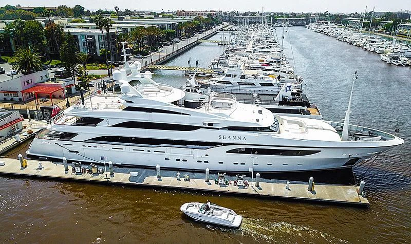 a large cruise ship docked aboard SEANNA Yacht for Sale