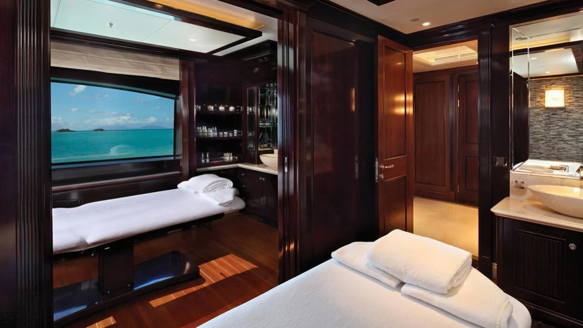 a room with a tv and a bed aboard SEANNA Yacht for Sale