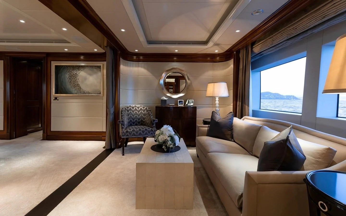 a living room with a large window aboard SEANNA Yacht for Sale