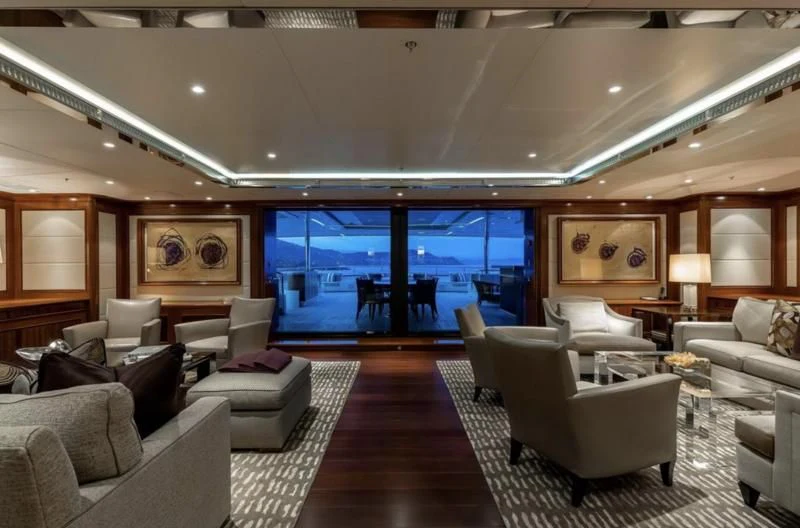 a living room with a large window aboard SEANNA Yacht for Sale