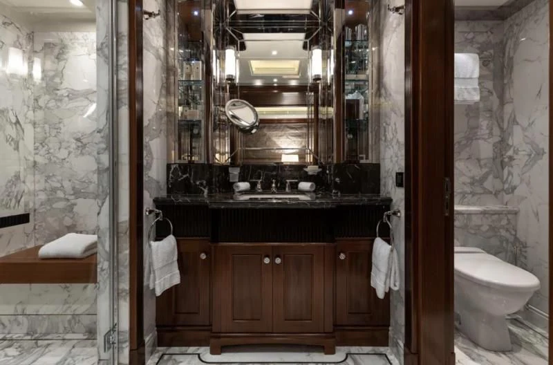 a bathroom with a sink and a toilet aboard SEANNA Yacht for Sale