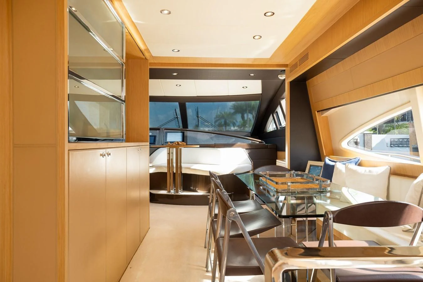 a room with a table and chairs aboard 75' RIVA 2012 Yacht for Sale
