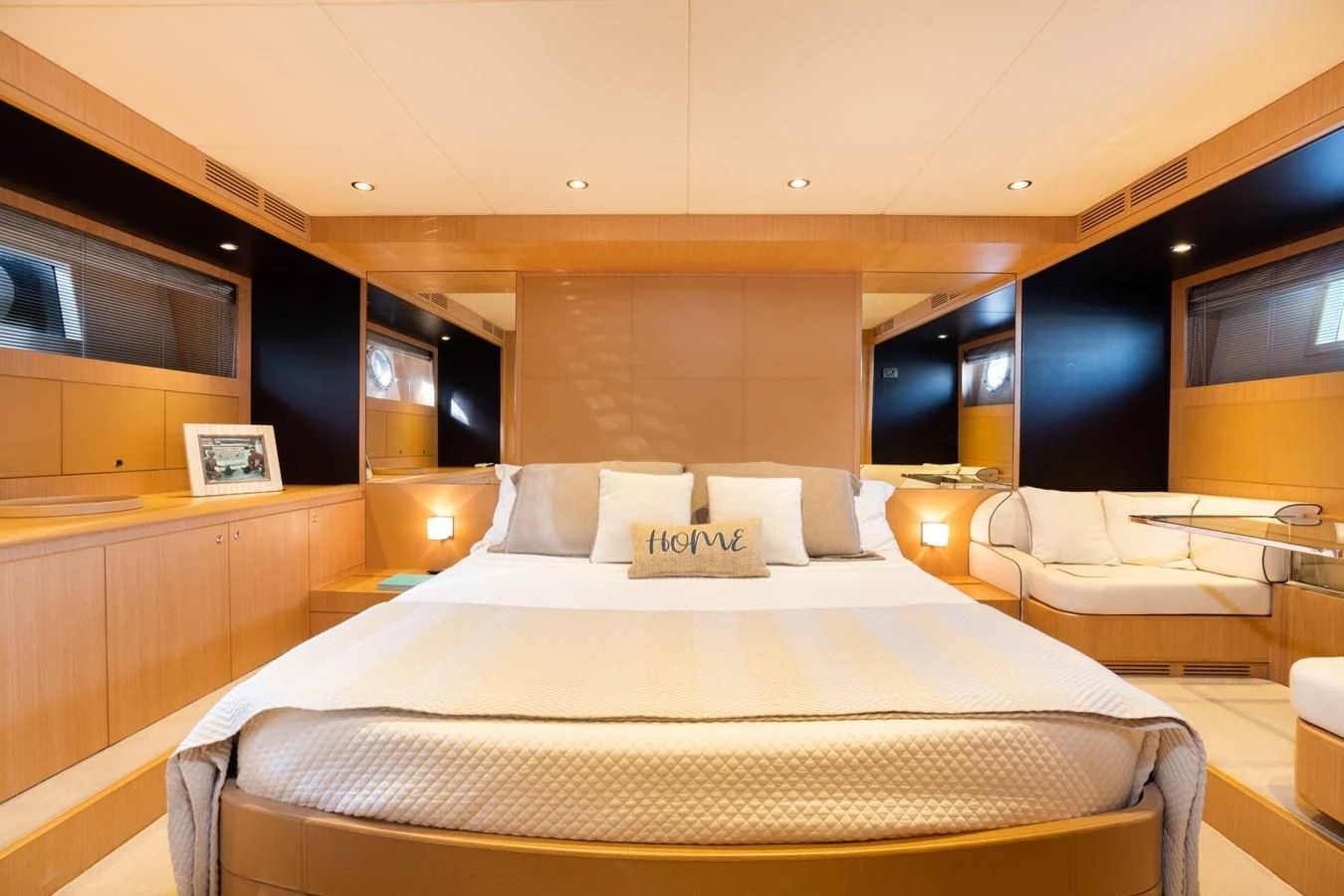 a room with a bed and a television aboard 75' RIVA 2012 Yacht for Sale