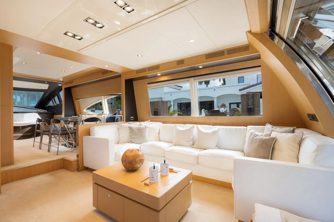 a living room with a couch and a table aboard 75' RIVA 2012 Yacht for Sale