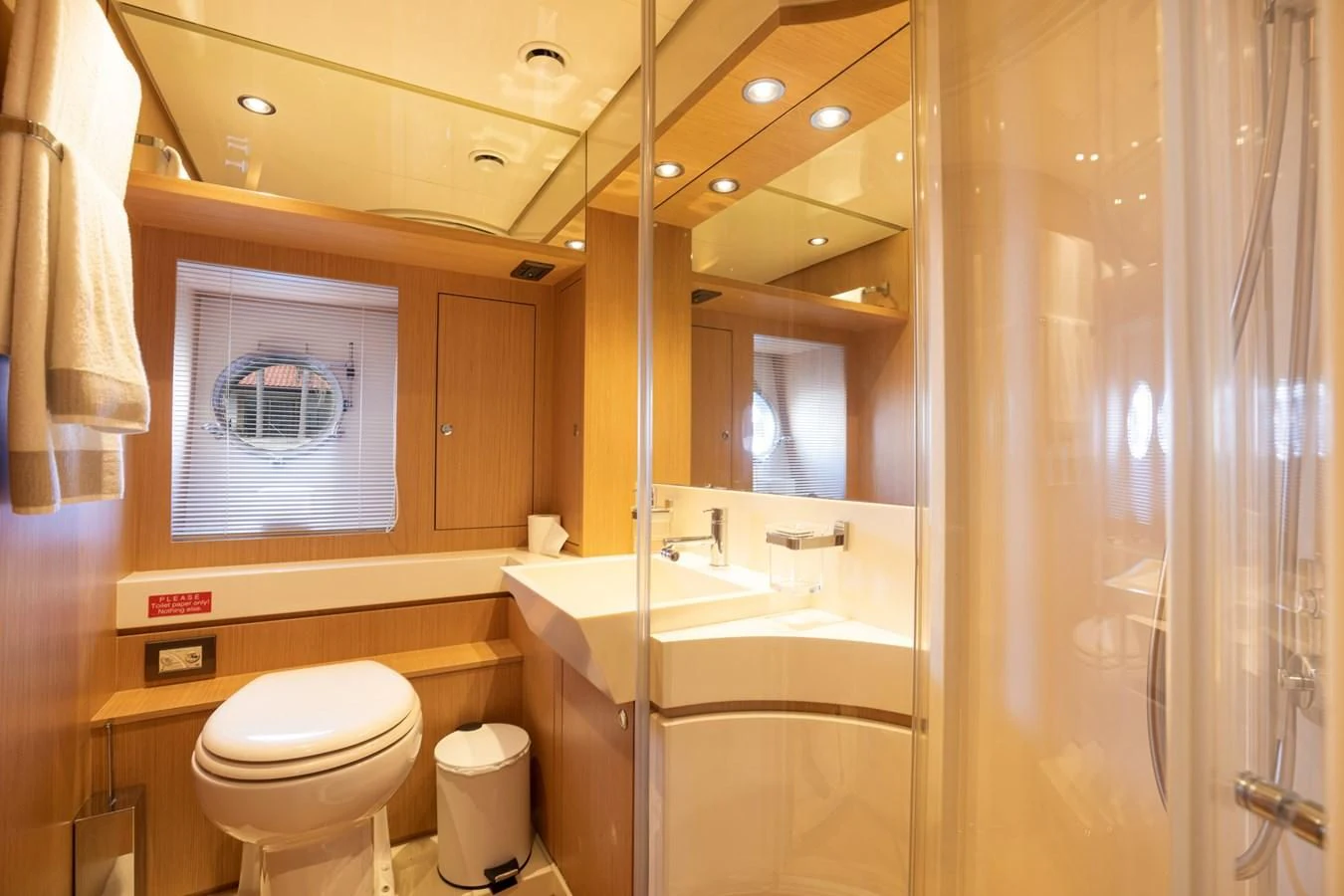 a bathroom with a sink toilet and a bathtub aboard 75' RIVA 2012 Yacht for Sale
