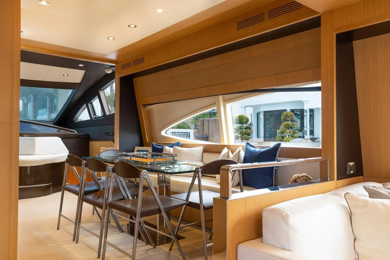 a living room with a couch and a table aboard 75' RIVA 2012 Yacht for Sale