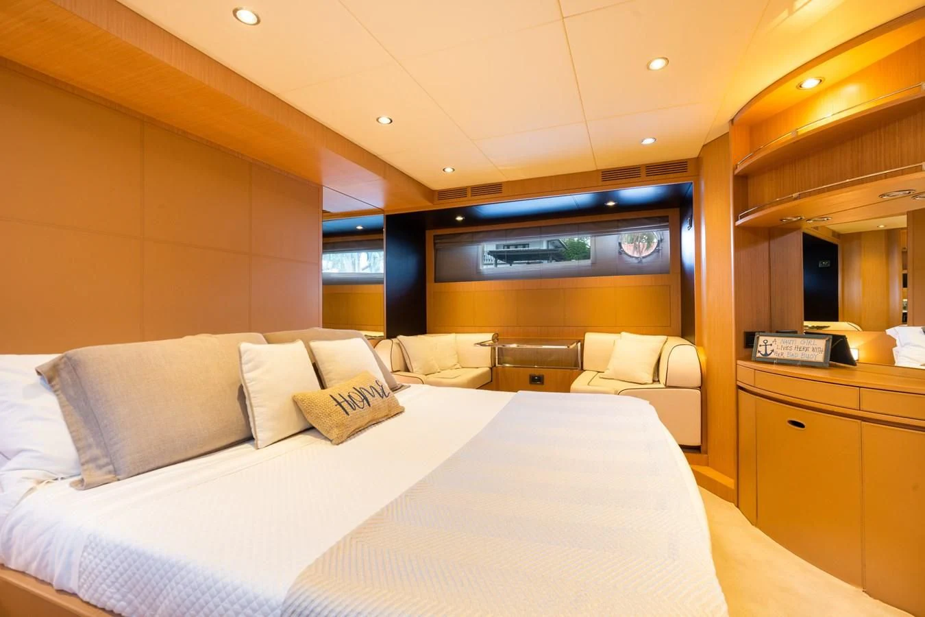 a room with a bed and a tv on the wall aboard 75' RIVA 2012 Yacht for Sale