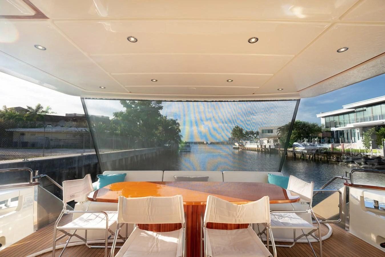 a room with a table chairs and a view of the city aboard 75' RIVA 2012 Yacht for Sale