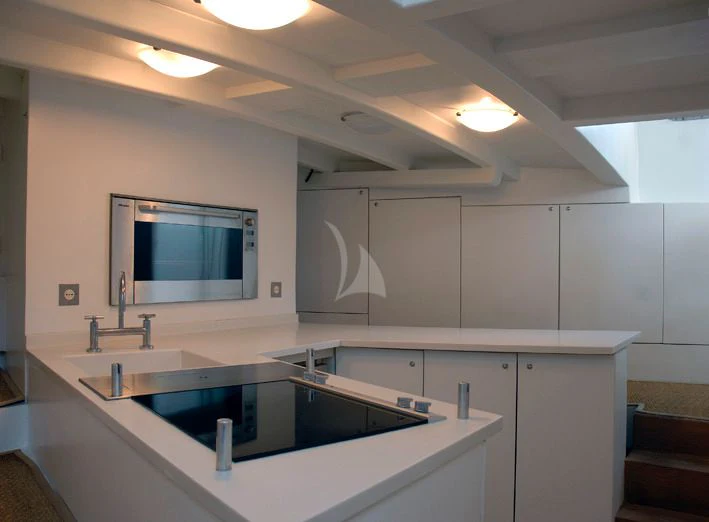a kitchen with a large mirror aboard LA MER Yacht for Sale