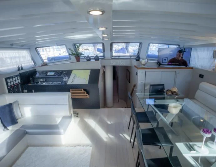 a room with a desk and a computer aboard LA MER Yacht for Sale