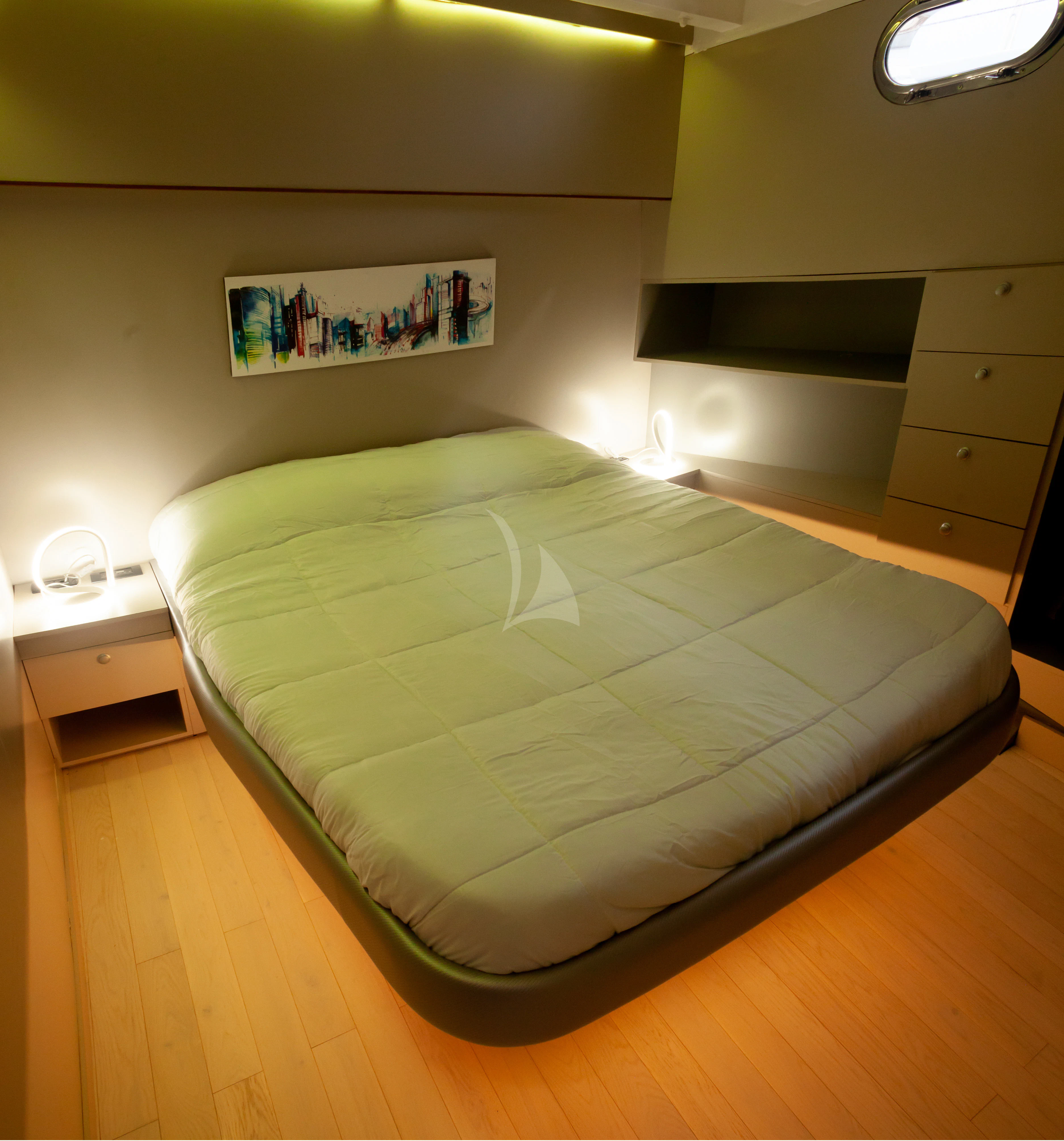 a bed in a room aboard LA MER Yacht for Sale