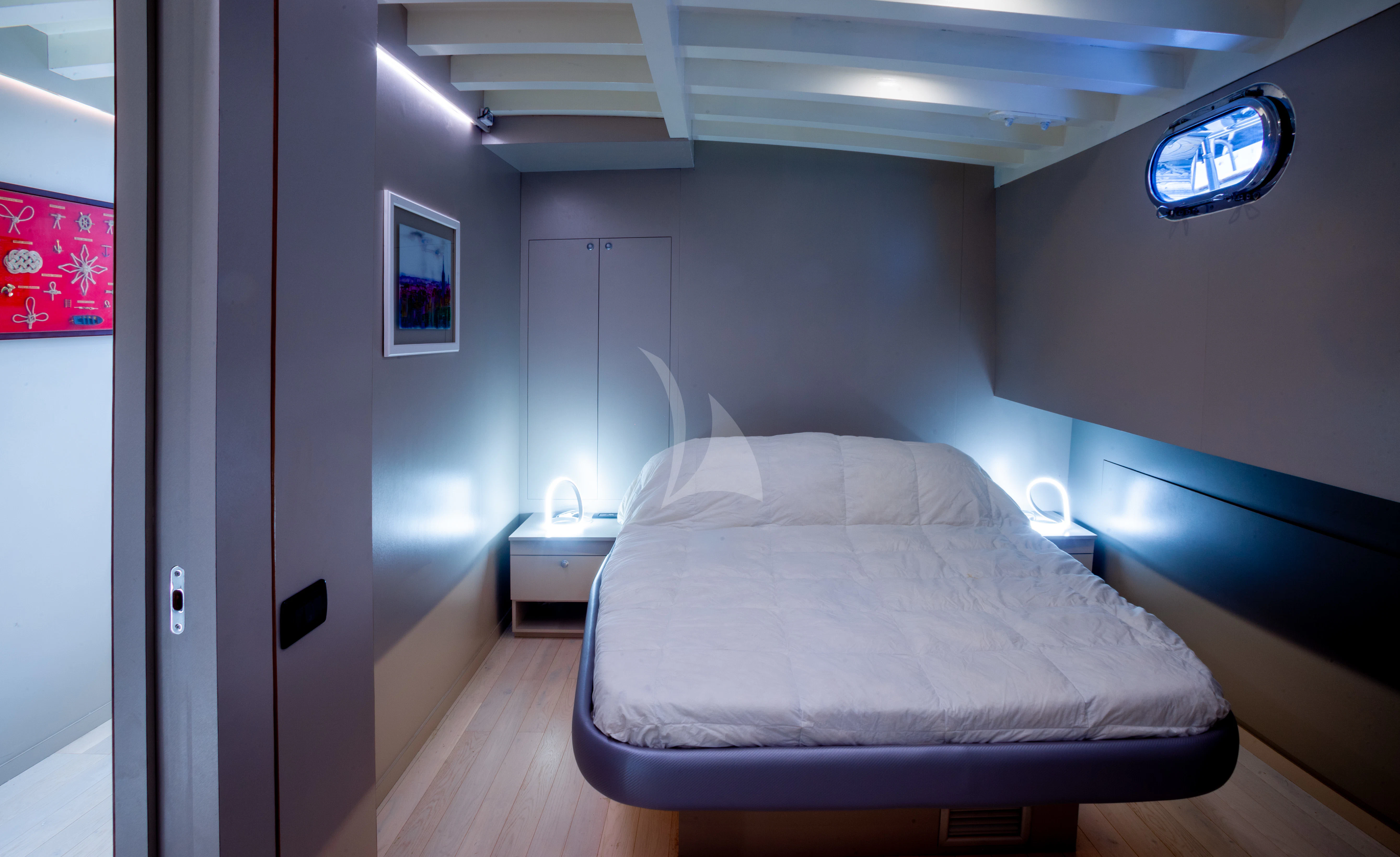 a bed in a room aboard LA MER Yacht for Sale