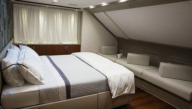 a room with two beds aboard R&R Yacht for Sale