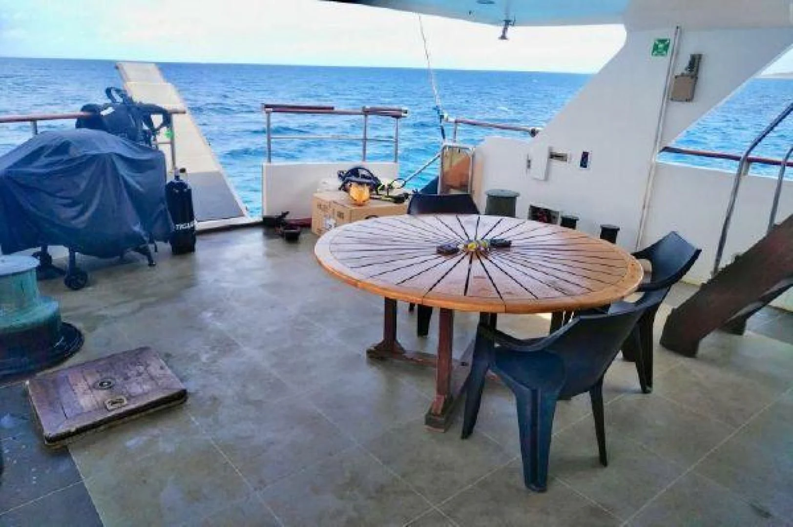a table with a chair on it aboard STAR ALLIANCE Yacht for Sale