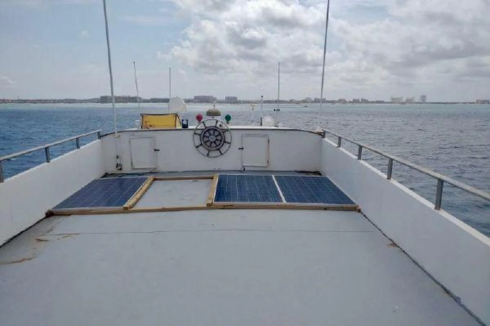 a boat with a bicycle on the front aboard STAR ALLIANCE Yacht for Sale
