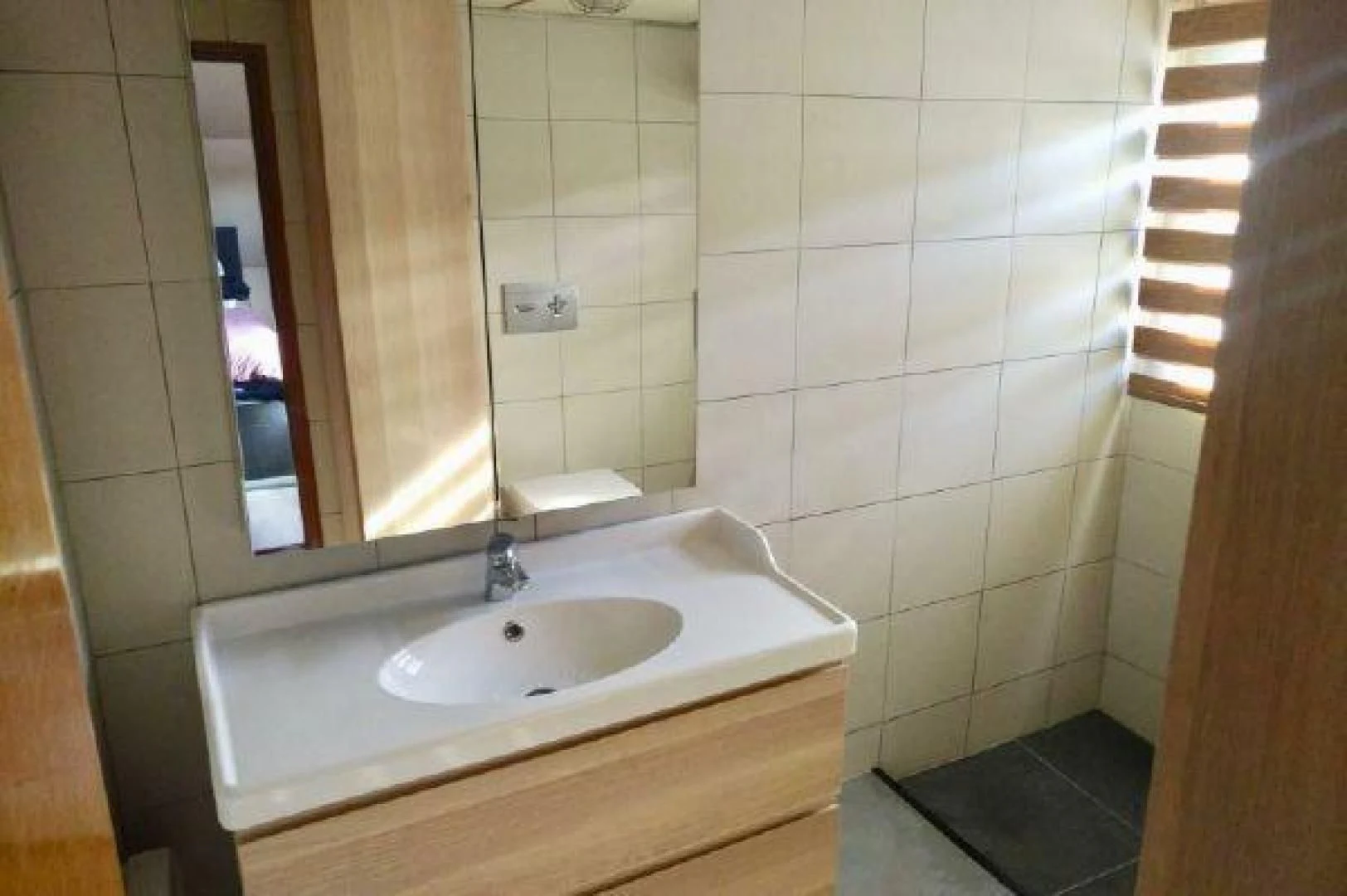 a bathroom with a sink and a mirror aboard STAR ALLIANCE Yacht for Sale