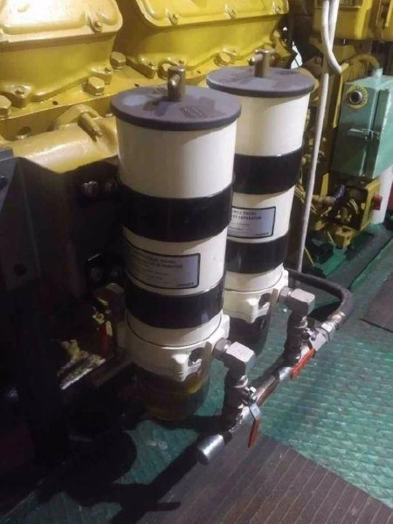 a machine with a black and white cap aboard STAR ALLIANCE Yacht for Sale