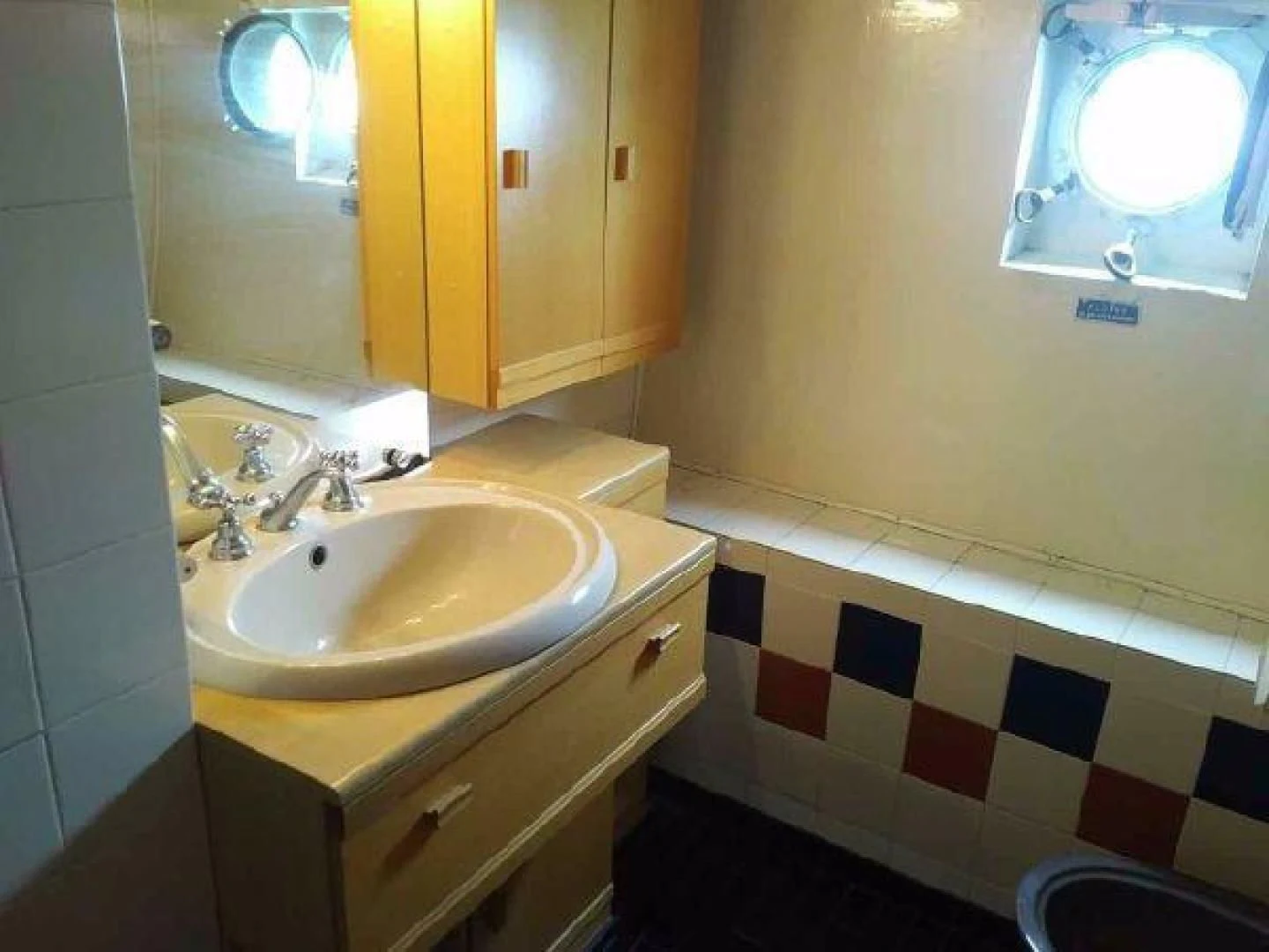 a bathroom with a sink and a mirror aboard STAR ALLIANCE Yacht for Sale