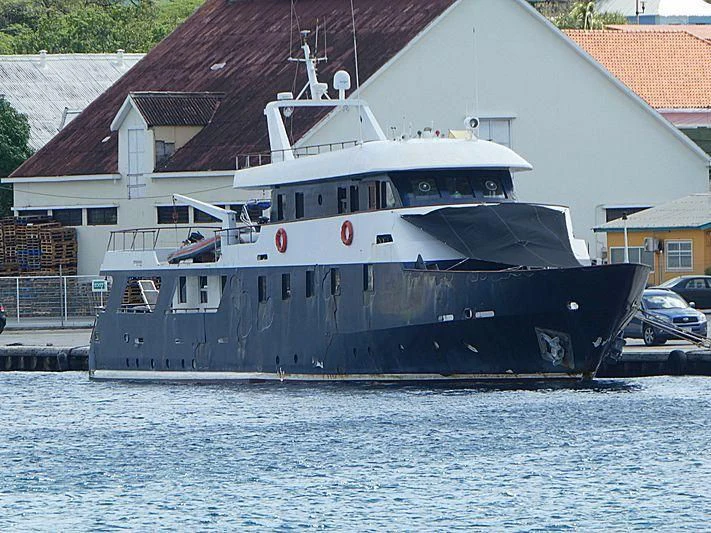 a boat docked at a pier aboard STAR ALLIANCE Yacht for Sale
