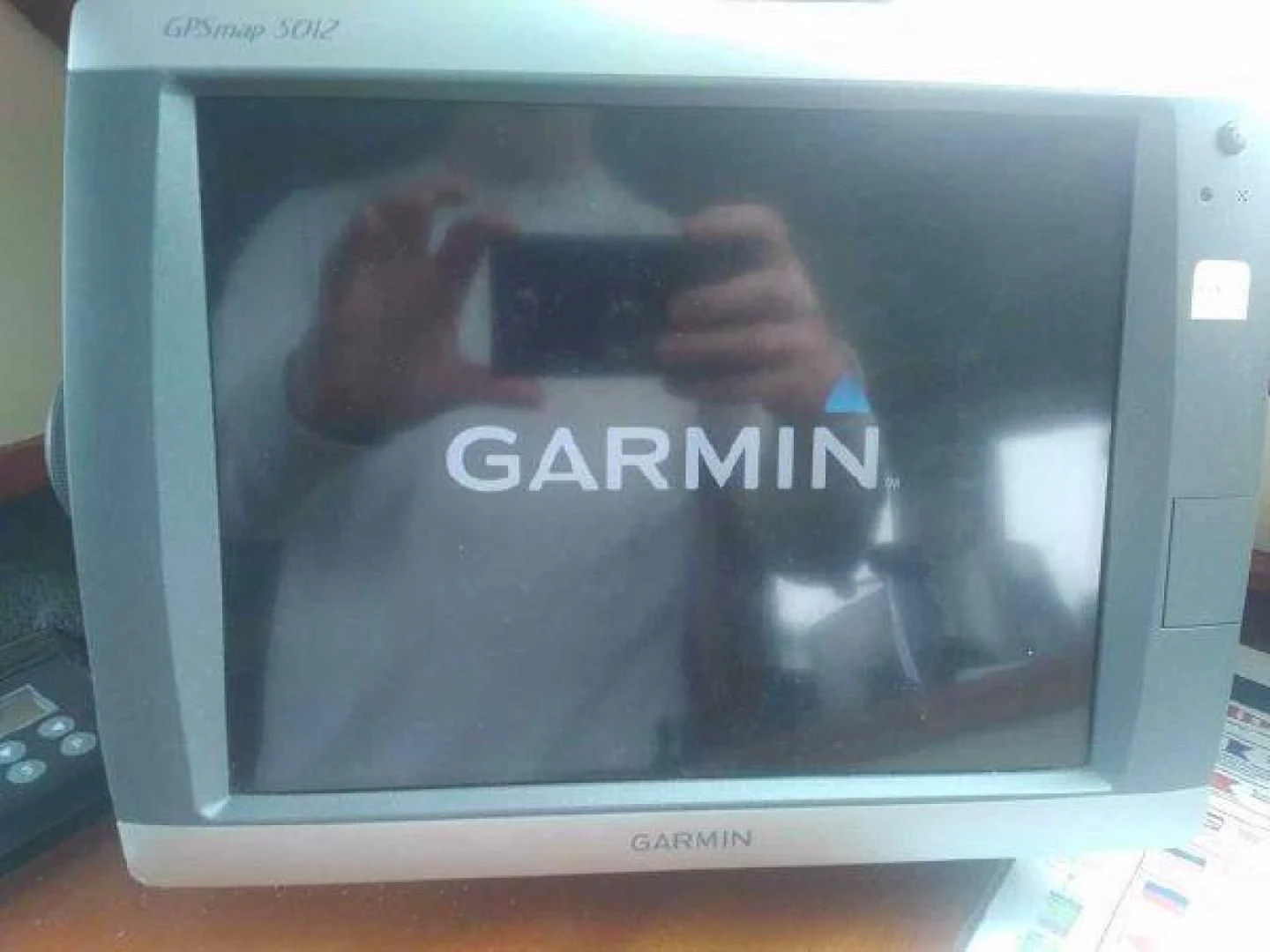 a person taking a picture of himself in a mirror aboard STAR ALLIANCE Yacht for Sale