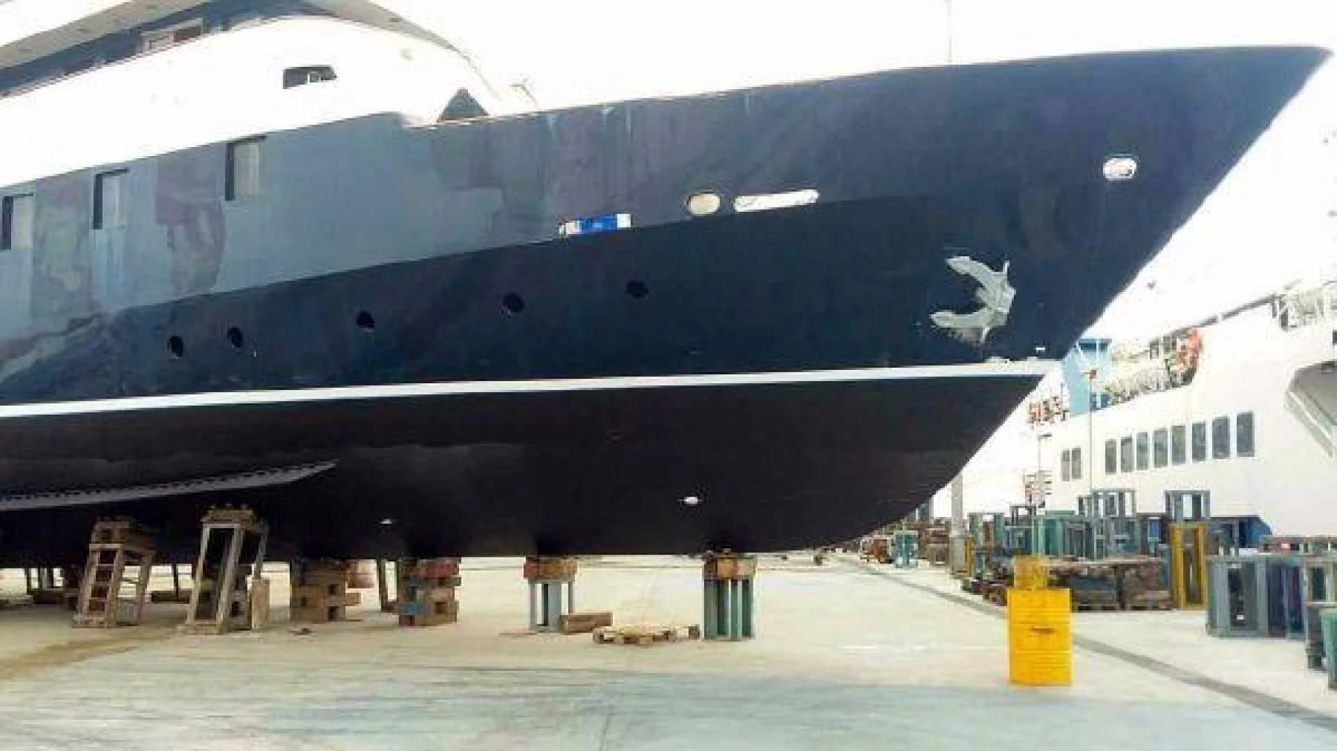 a large black airplane aboard STAR ALLIANCE Yacht for Sale