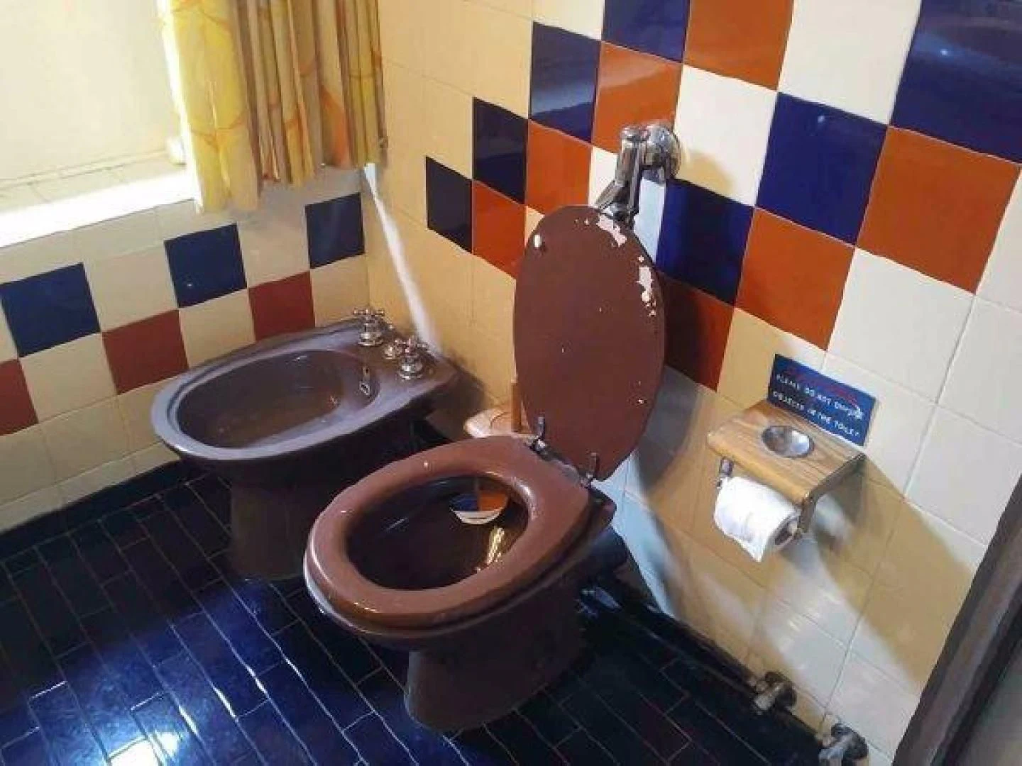 a bathroom with a toilet and a sink aboard STAR ALLIANCE Yacht for Sale