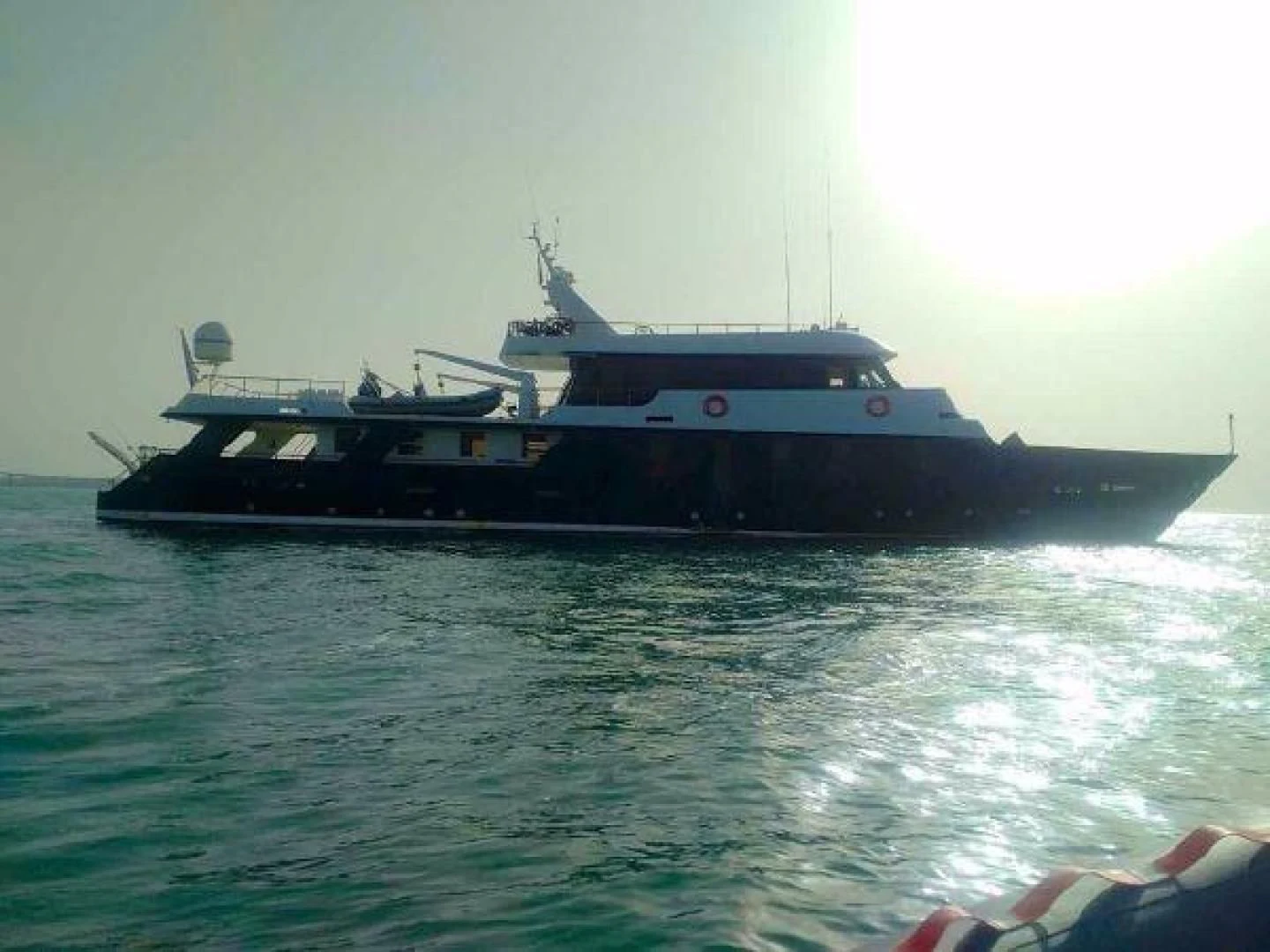 a boat on the water aboard STAR ALLIANCE Yacht for Sale