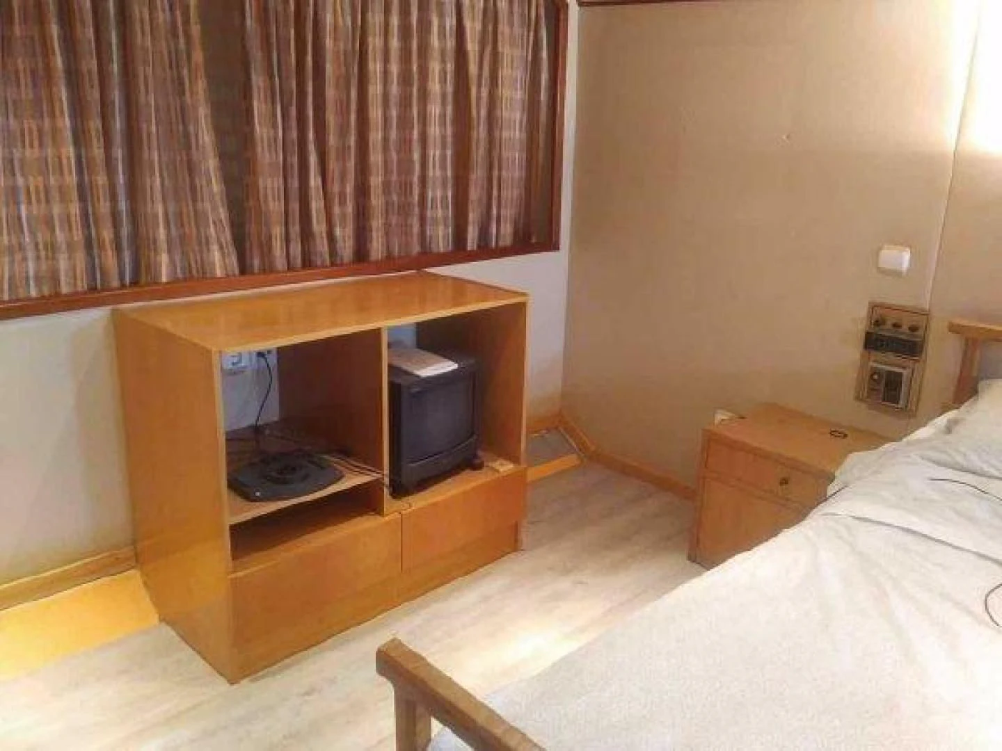 a bed and a desk in a room aboard STAR ALLIANCE Yacht for Sale