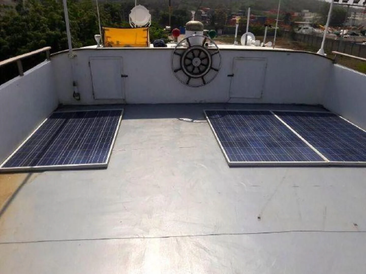 a person standing on a roof aboard STAR ALLIANCE Yacht for Sale