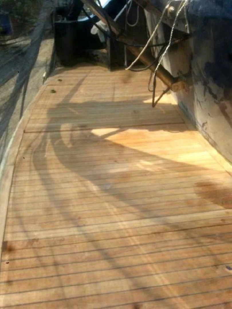a wooden deck with a wood floor aboard STAR ALLIANCE Yacht for Sale
