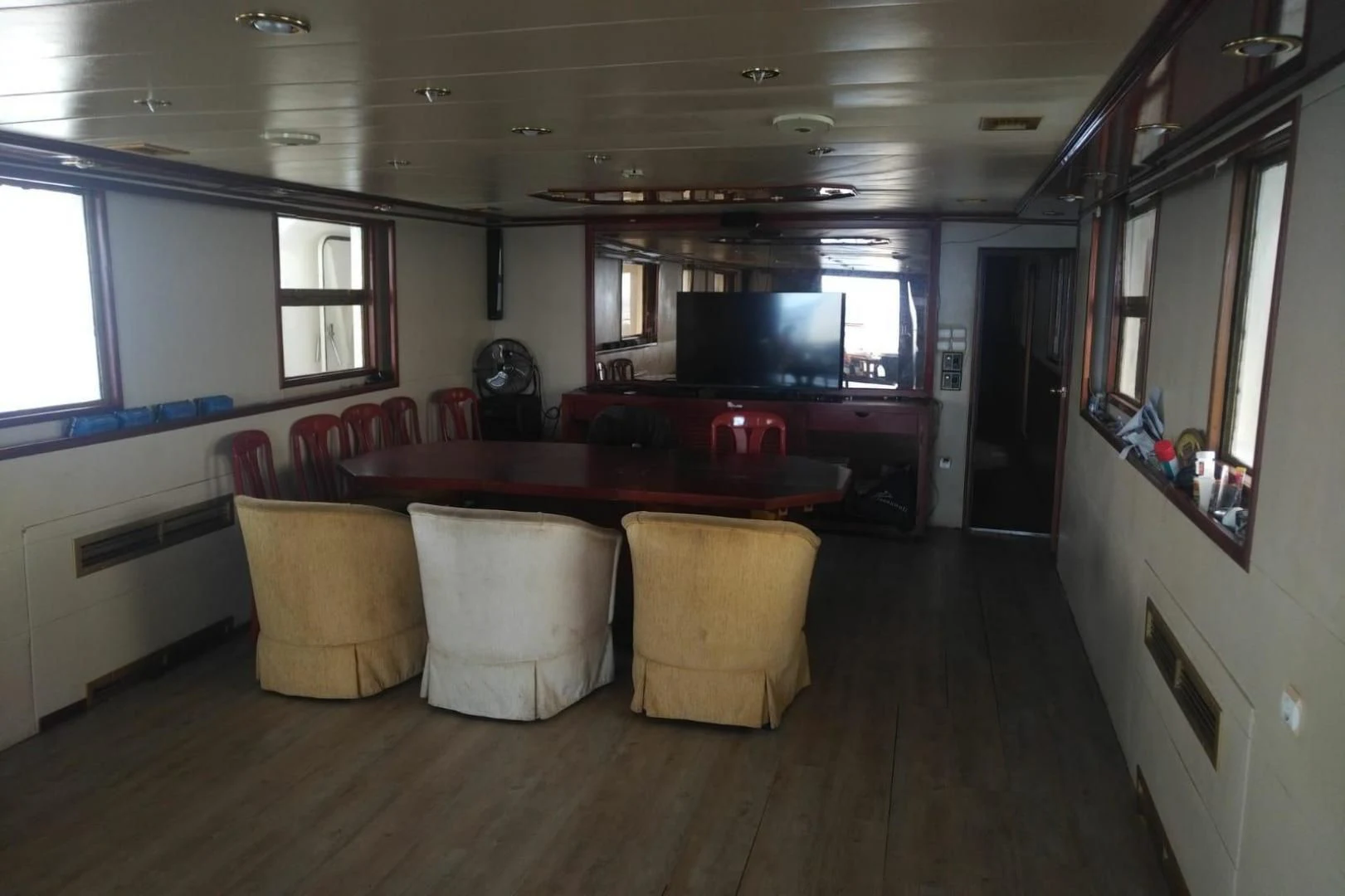 a room with a table and chairs aboard STAR ALLIANCE Yacht for Sale