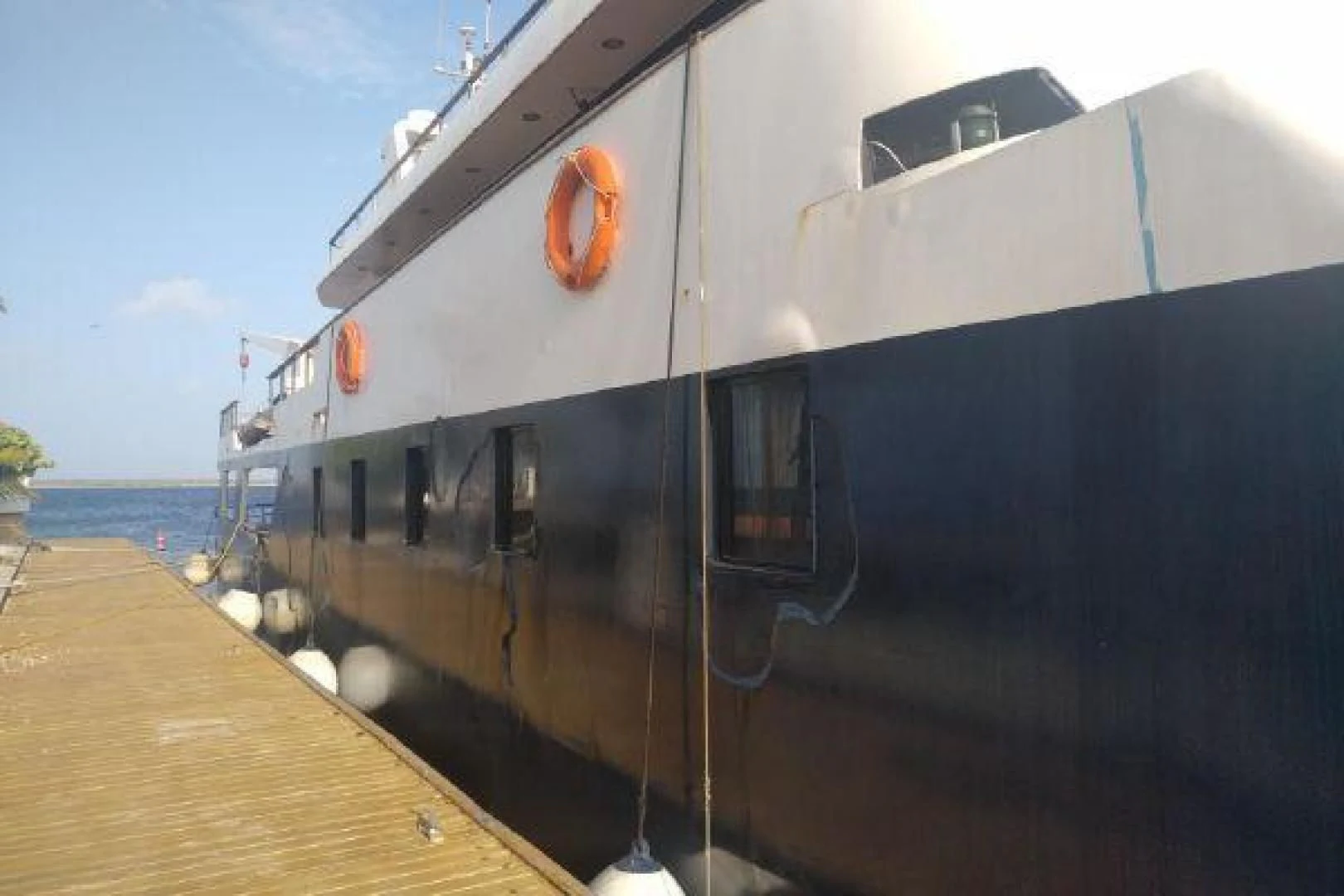 a large ship docked aboard STAR ALLIANCE Yacht for Sale