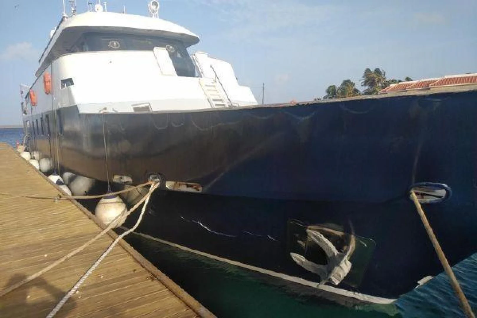 a boat docked at a pier aboard STAR ALLIANCE Yacht for Sale