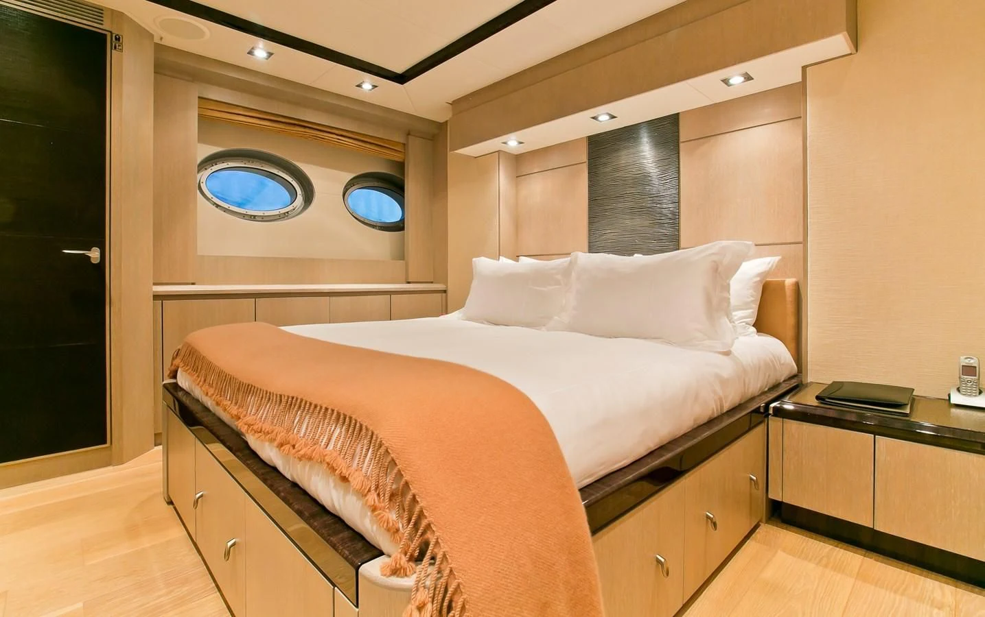 a bed with a white pillow aboard AK ROYALTY Yacht for Sale