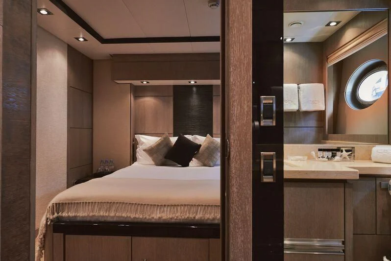 a hotel room with a bed aboard AK ROYALTY Yacht for Sale