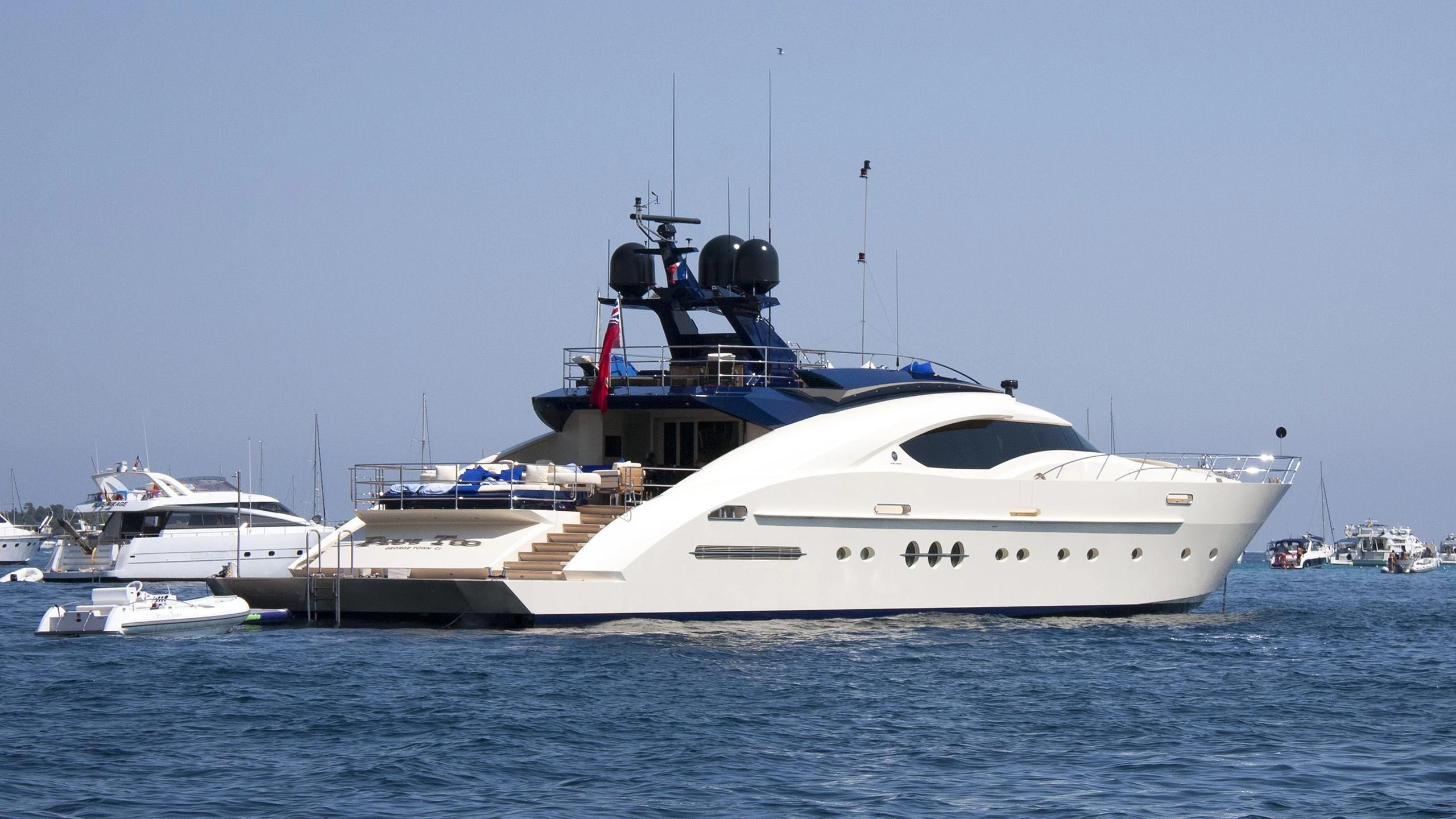 a white yacht in the water aboard AK ROYALTY Yacht for Sale